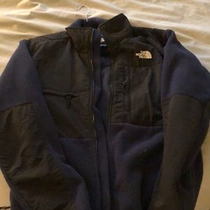 Blue and black north face winter jacket